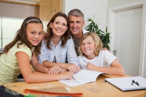 Family doing homework together